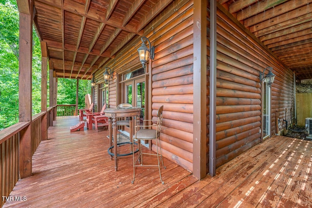 wooden terrace featuring french doors