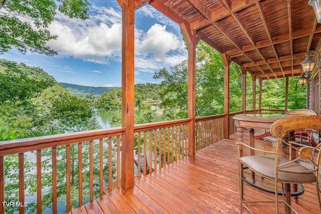 deck featuring a water view