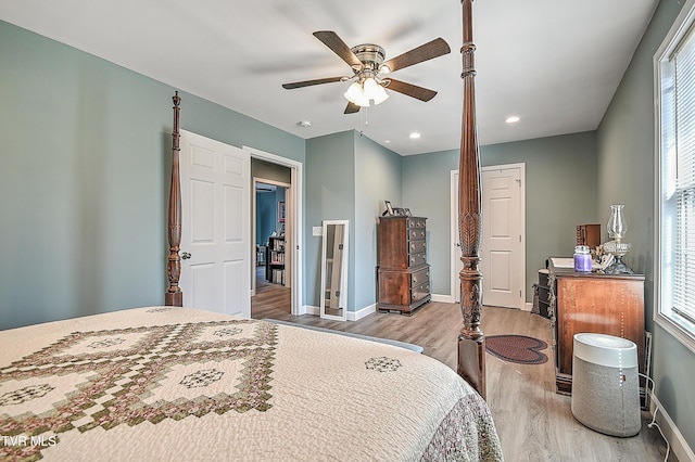 bedroom featuring a ceiling fan, recessed lighting, baseboards, and wood finished floors