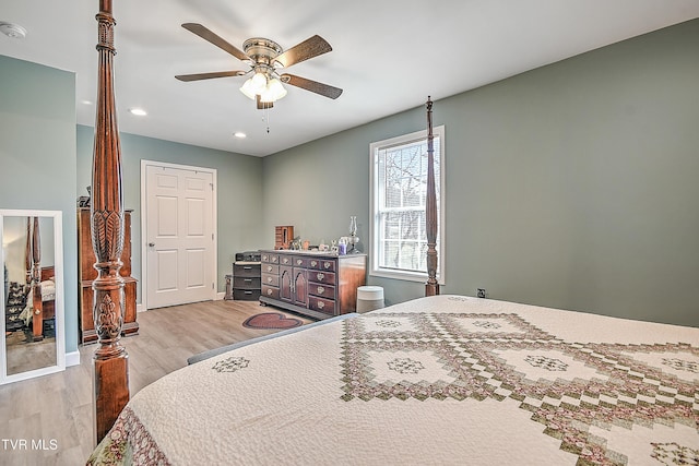 bedroom with baseboards, ceiling fan, light wood-type flooring, and recessed lighting