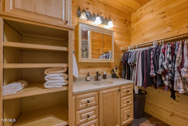 spacious closet featuring a sink