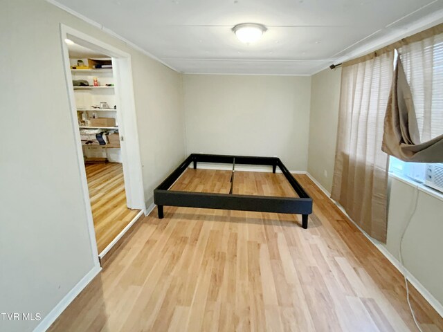 1536 Pineola Ave, Kingsport, TN 37664 - bedroom with baseboards, ornamental molding, and wood finished floors
