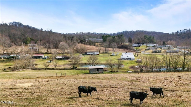 exterior space with a rural view