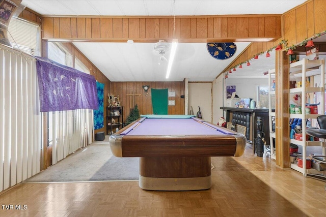 rec room with wood walls, billiards, and vaulted ceiling