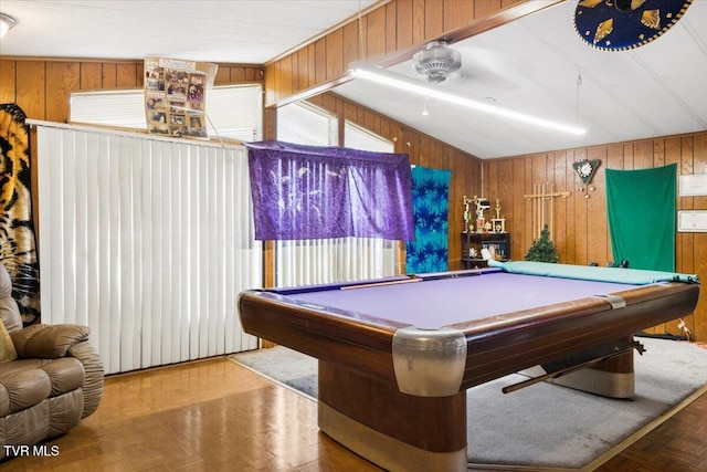 playroom featuring lofted ceiling, pool table, and wood walls