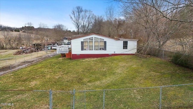 exterior space with crawl space, a front yard, and a fenced backyard