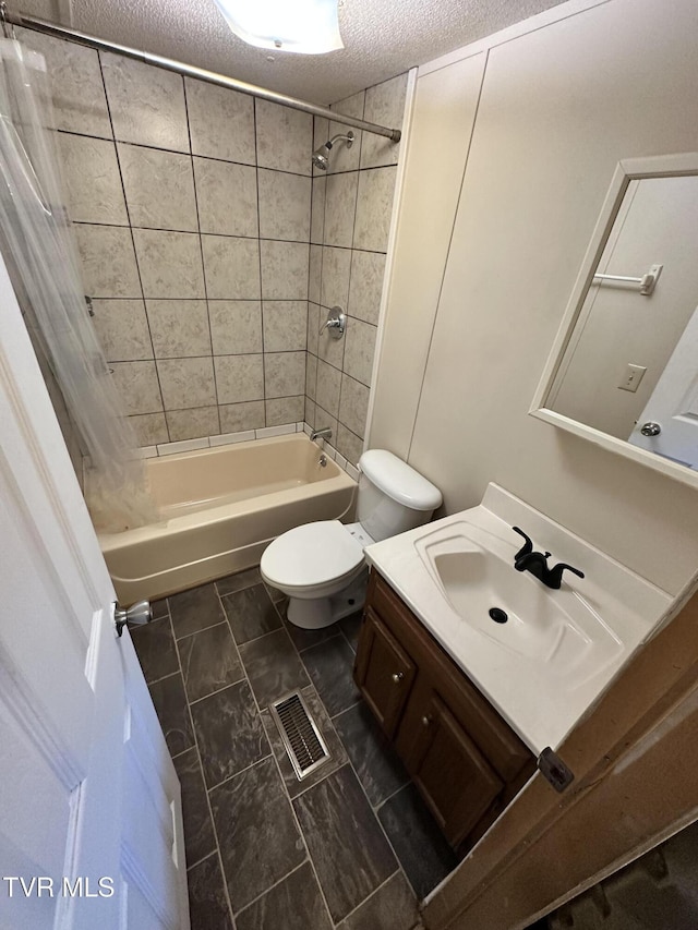 full bath with visible vents, toilet, vanity, a textured ceiling, and shower / bath combination with curtain