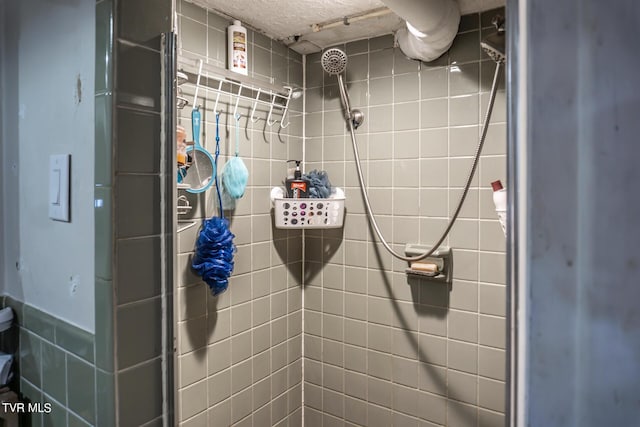 bathroom with a stall shower