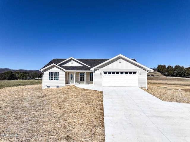 view of front facade featuring concrete driveway, board and batten siding, an attached garage, and roof with shingles