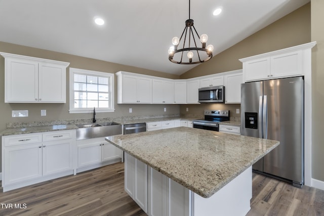 kitchen featuring white cabinetry, stainless steel appliances, and a sink