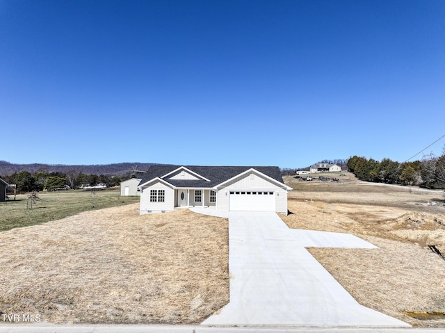 view of front facade with driveway and an attached garage