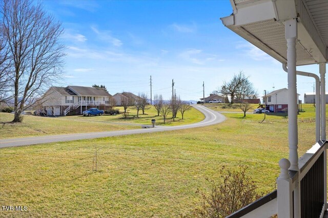 view of yard featuring a residential view