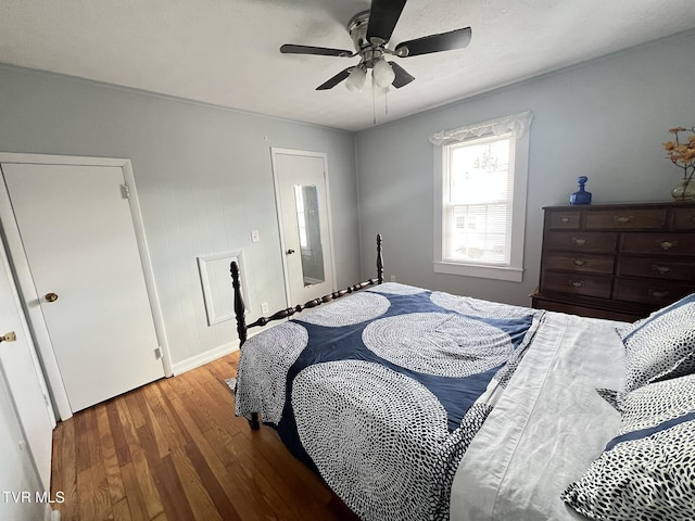 bedroom featuring ceiling fan and wood finished floors