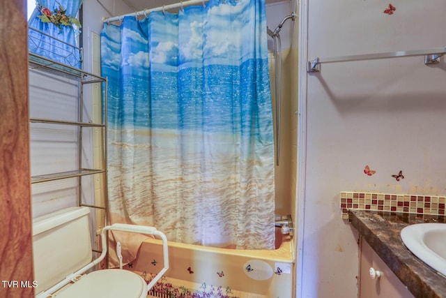 full bathroom featuring toilet, shower / bath combo with shower curtain, backsplash, and vanity