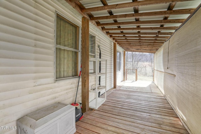 wooden deck featuring covered porch