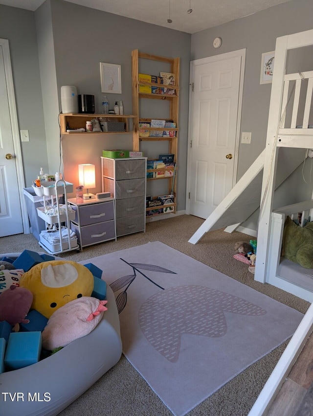 playroom featuring carpet