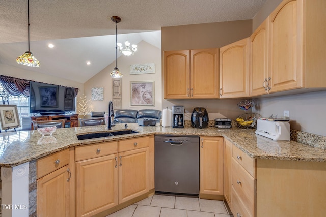 kitchen with light stone counters, light brown cabinets, a peninsula, a sink, and dishwasher