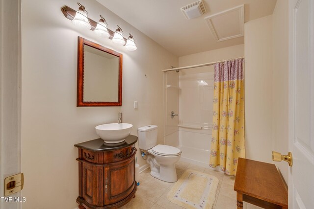 bathroom featuring visible vents, a shower with shower curtain, toilet, tile patterned floors, and vanity