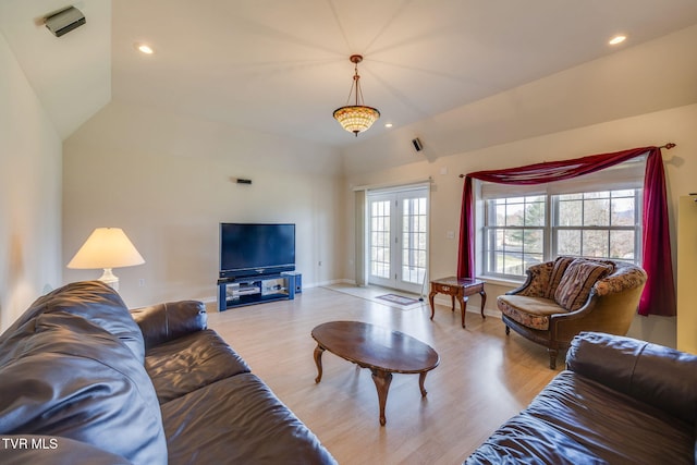 living room with french doors, recessed lighting, visible vents, wood finished floors, and baseboards