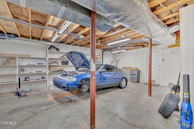 garage with electric water heater