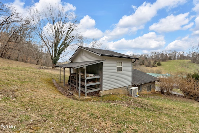 view of outbuilding with ac unit and an outdoor structure