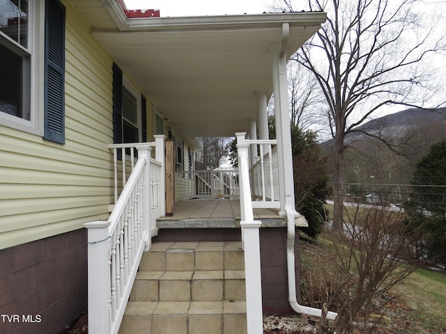 wooden deck featuring a porch