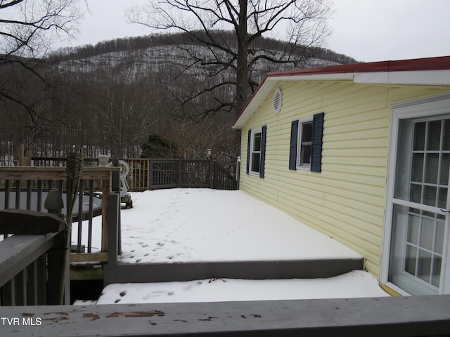 view of snow covered deck