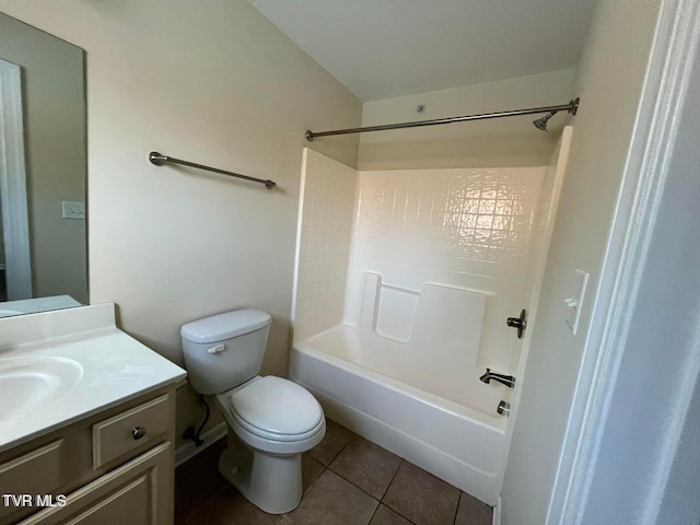 full bathroom featuring toilet, shower / bath combination, vanity, and tile patterned floors