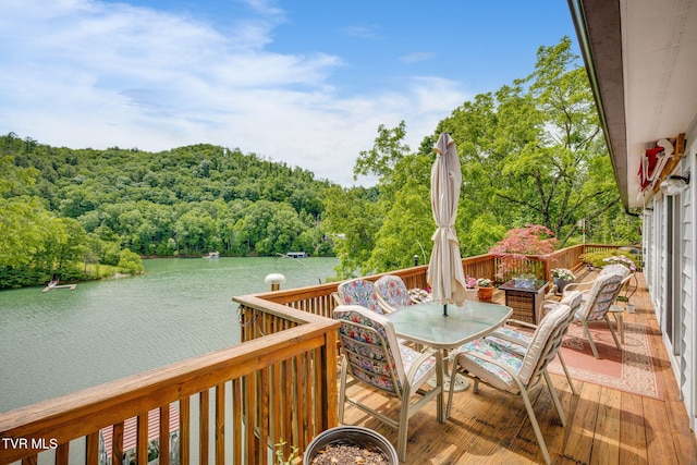465 Big Oak Dr, Butler, TN 37640 - wooden terrace featuring a forest view, a water view, and outdoor dining area