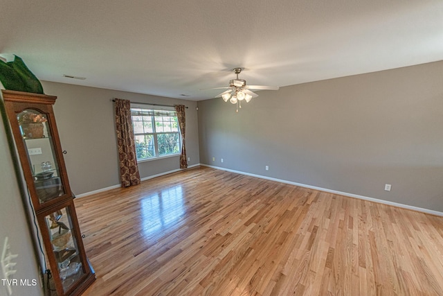 408 Stratford Ct Unit 408, Gray, TN 37615 - spare room featuring light wood-style flooring, baseboards, a ceiling fan, and visible vents