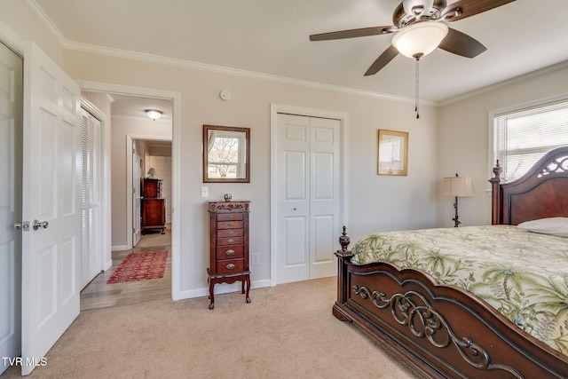 1545 Old State Route 34, Telford, TN 37690 - bedroom featuring crown molding, light colored carpet, baseboards, a ceiling fan, and a closet