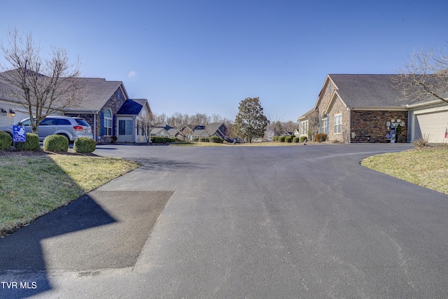 view of street featuring a residential view