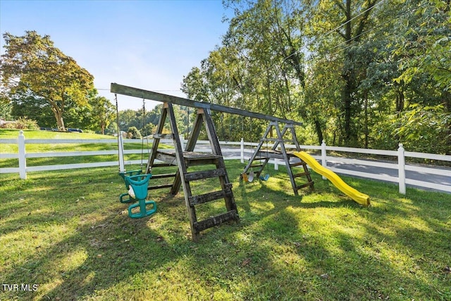 view of playground with a yard