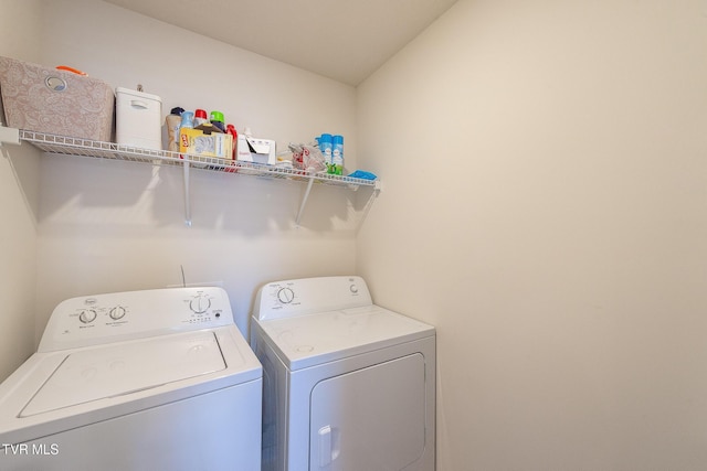 laundry room featuring laundry area and washing machine and dryer