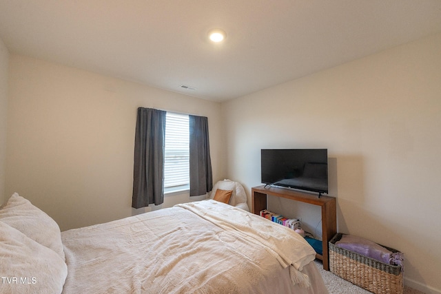 bedroom with visible vents