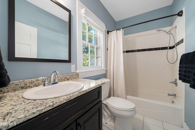 bathroom with shower / bath combo, vanity, and toilet