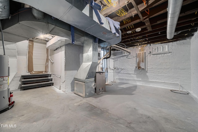 unfinished basement with water heater and heating unit