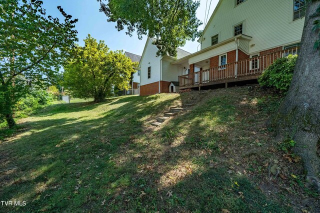 view of yard with a deck