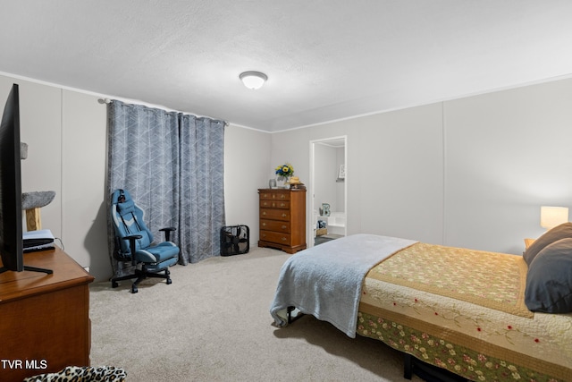 carpeted bedroom featuring a textured ceiling