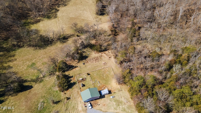 aerial view featuring a view of trees