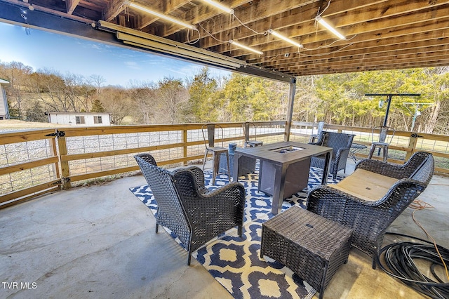 view of patio featuring a fire pit