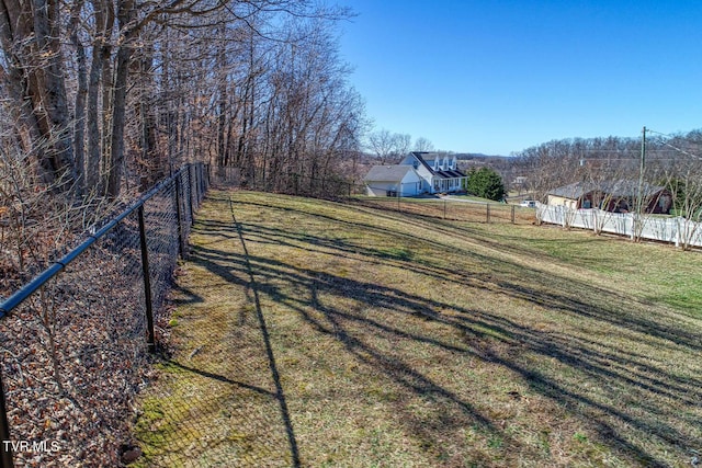 view of yard with fence