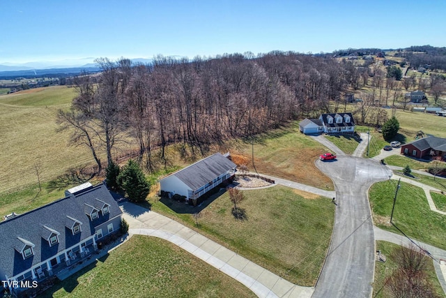 bird's eye view with a view of trees