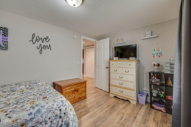 bedroom featuring light wood-type flooring