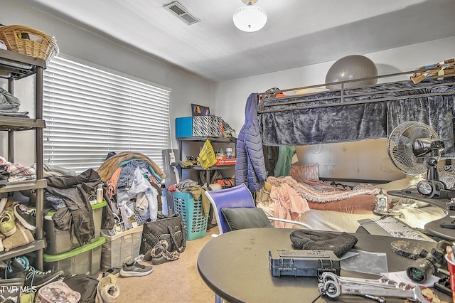 carpeted bedroom with visible vents