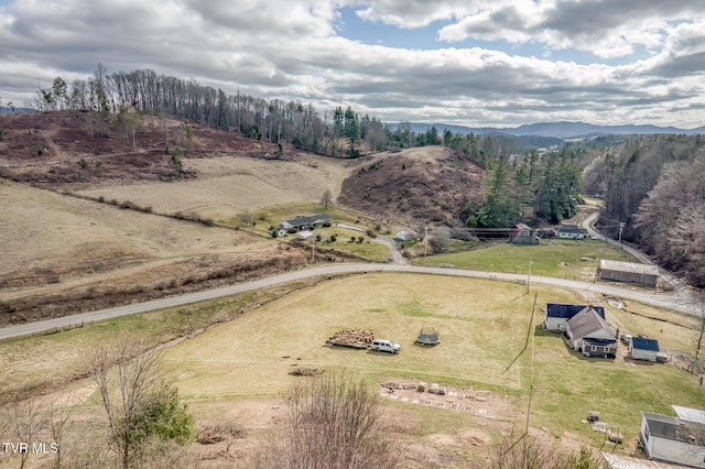 bird's eye view with a mountain view and a rural view