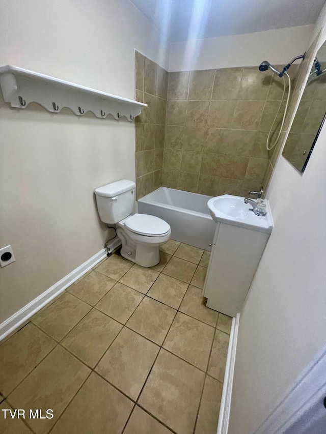 bathroom featuring vanity, baseboards, tile patterned flooring, shower / tub combination, and toilet