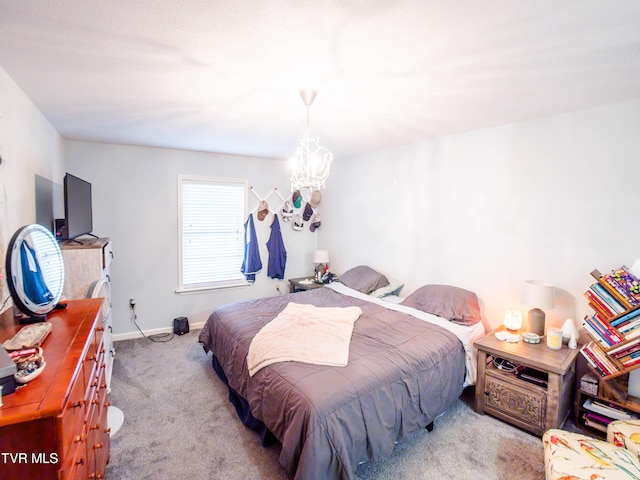 5659 Browning Way, Russellville, TN 37860 - bedroom with carpet, an inviting chandelier, and baseboards