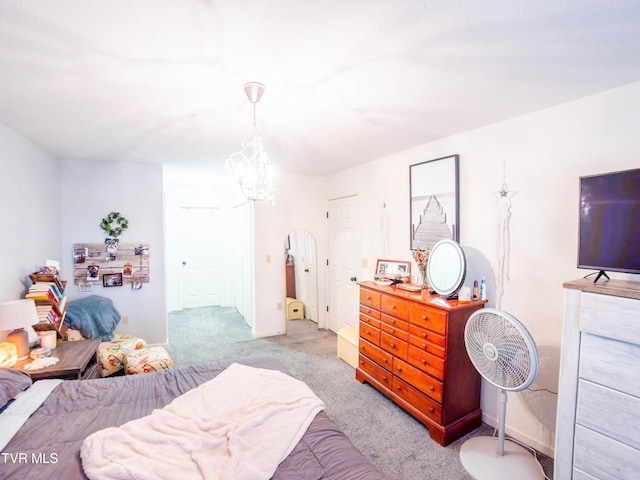 5659 Browning Way, Russellville, TN 37860 - bedroom with baseboards, arched walkways, a notable chandelier, and light colored carpet