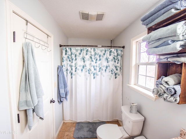 5659 Browning Way, Russellville, TN 37860 - full bathroom with toilet, curtained shower, and visible vents